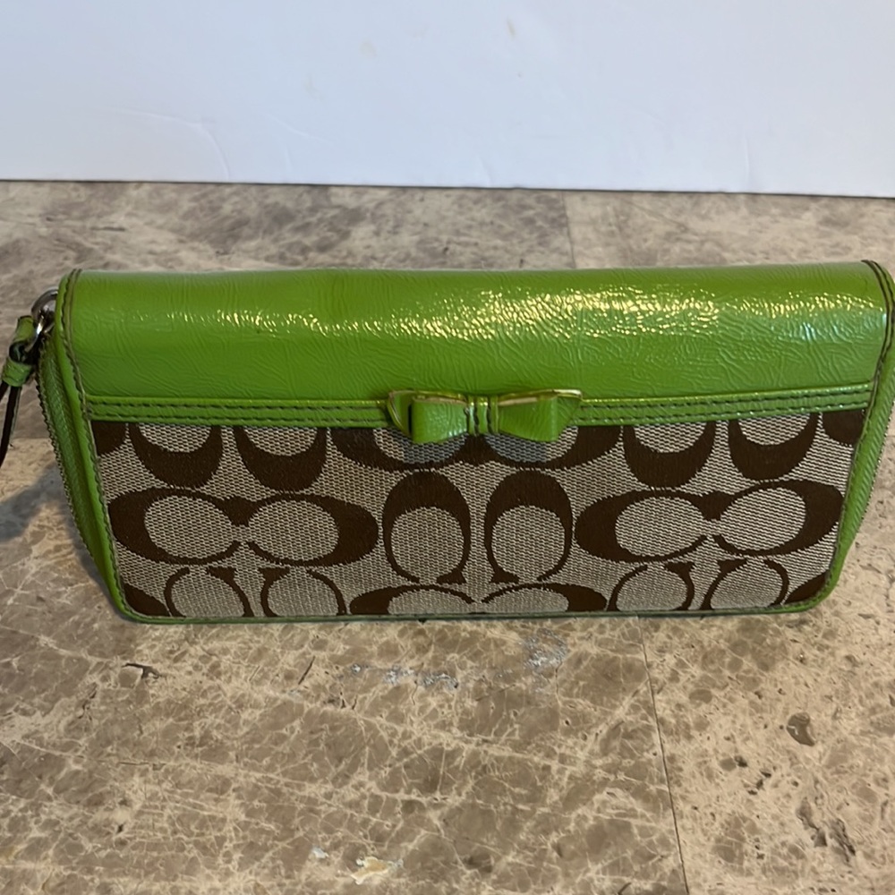 Coach Signature Tan and Light Green Zip Around Wallet -- Coated Canvas Interior